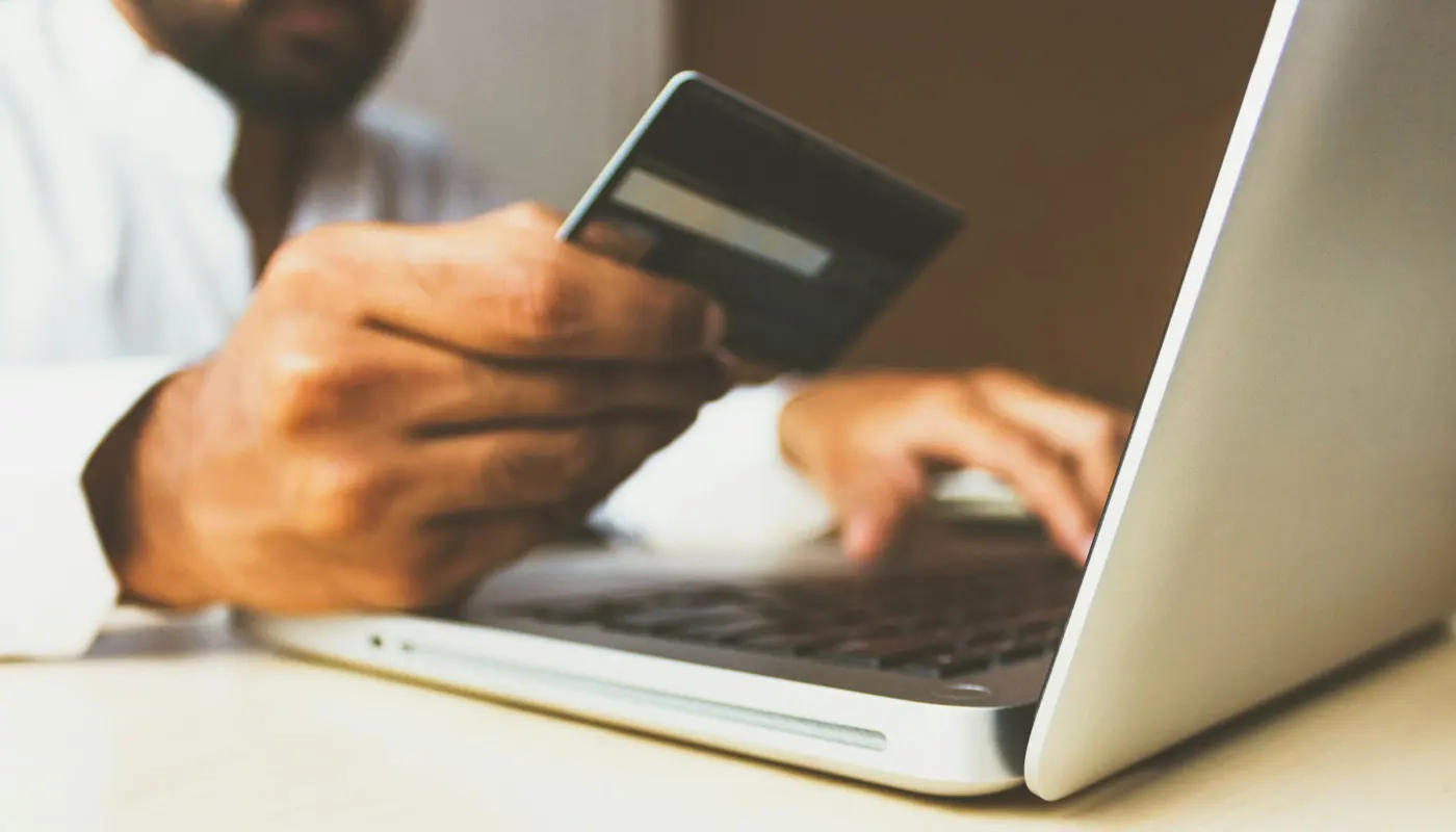 Man paying with credit card online